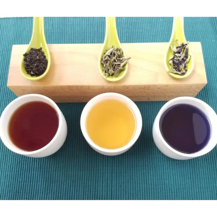 A photo of a selection of teas provided by Atlantic Spice. From left to right: Irish Breakfast tea, White tea, and Butterfly Pea Flower tea